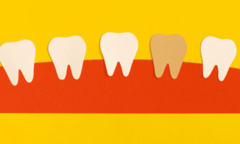 single dark tooth